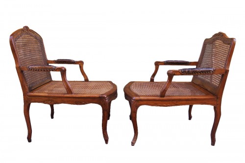 Pair of Louis XV caned armchairs, one stamped Antoine Bonnemain