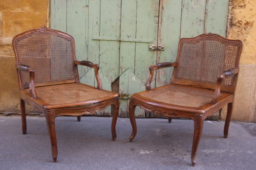 Seating  - Pair of Louis XV caned armchairs, one stamped Antoine Bonnemain