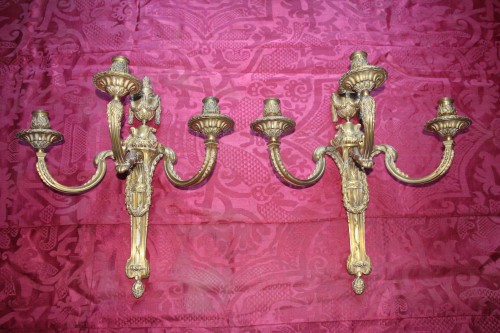 Paire d'appliques Louis XVI d'après Delafosse - Didascalies