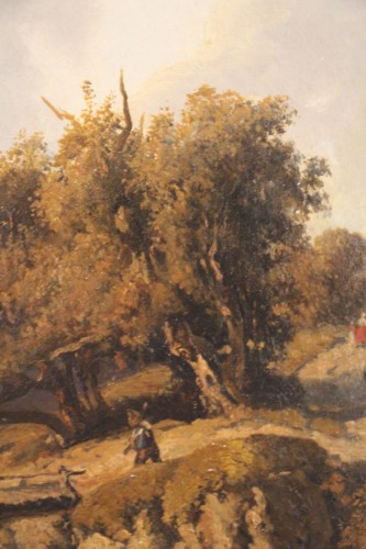 XIXe siècle - Paysage animé de personnages, signé Alexandre-Gabriel Decamps (1803-1860).