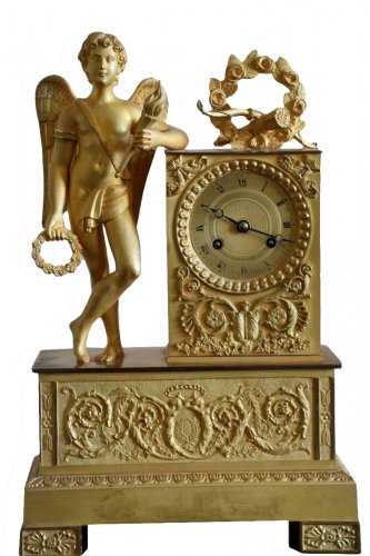 Pendule en bronze doré animée d'un ange, époque Empire, début du XIXe siècle