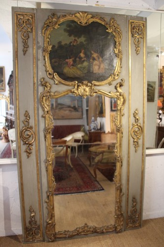 Miroirs, Trumeaux  - Trumeau de boiserie, richement sculpté de bois dorés, époque Louis XV