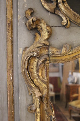 Antiquités - Trumeau de boiserie, richement sculpté de bois dorés, époque Louis XV