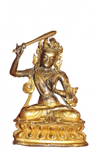 Buddha of wisdom with sword Manjushri out of gilded bronze, Tibet, at the end of XVIIe.