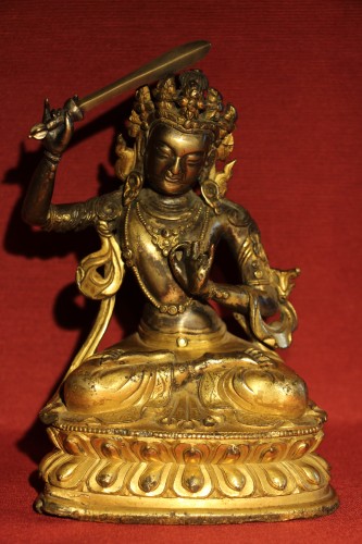 Bouddha de la sagesse avec épée Manjushri en bronze doré, Tibet, fin XVIIe. - Arts d