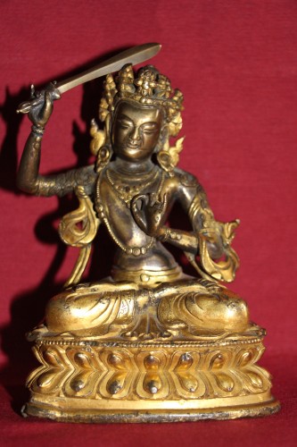 Asian Works of Art  - Buddha of wisdom with sword Manjushri out of gilded bronze, Tibet, at the end of XVIIe.