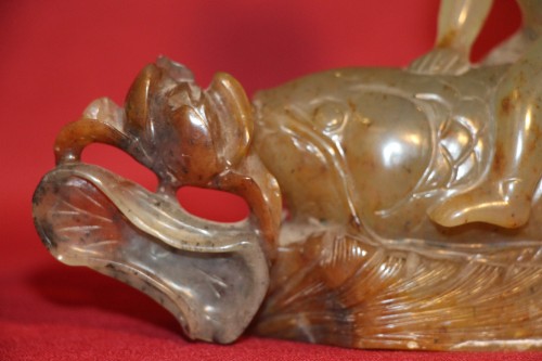 Asian Works of Art  - Child and fish in jade, China 19th century