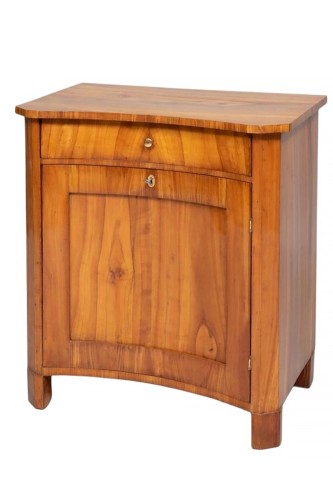 A Biedermeier concave center door half-cabinet, Saxony circa 1830