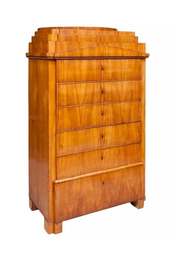 A Biedermeier tallboy, known as a "Chiffonière," circa 1825