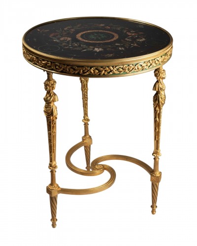 Table en bronze doré, modèle d'Adam Weisweiler
