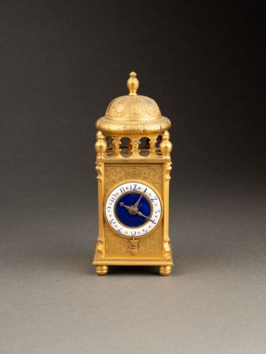 19th-century gilt bronze table clock with a blue and white enamel dial - 