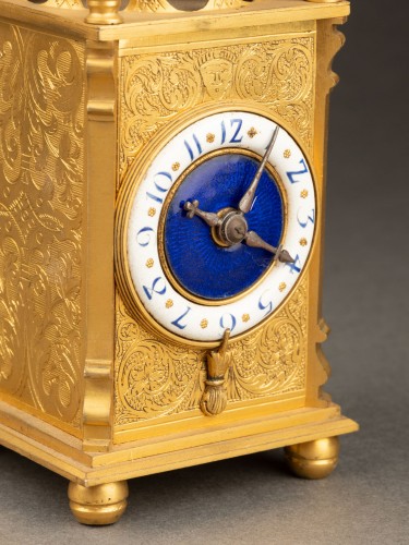 Antiquités - 19th-century gilt bronze table clock with a blue and white enamel dial