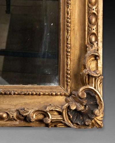  - Miroir au cartouche figurant un soleil, milieu XVIIIe