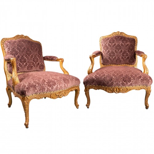 Paire de larges fauteuils époque Régence XVIIIe siècle