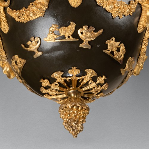 Antiquités - Lustre en bronze patiné et doré époque Empire circa 1800