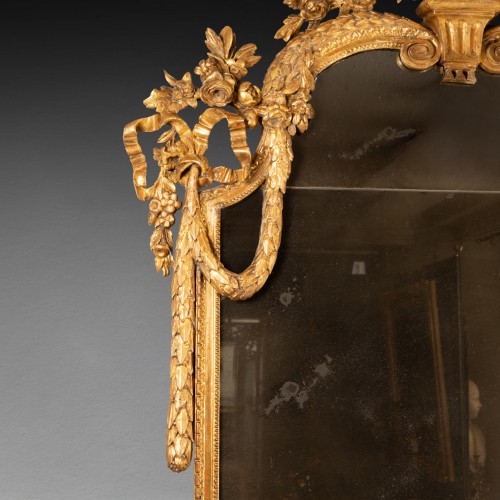 Miroir en bois doré époque Louis XVI deuxième moitié XVIIIe siècle - Miroirs, Trumeaux Style Louis XVI