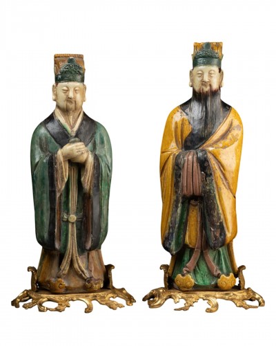Pair of Ming Dynasty Chinese figures with bronze mounts, 18th century