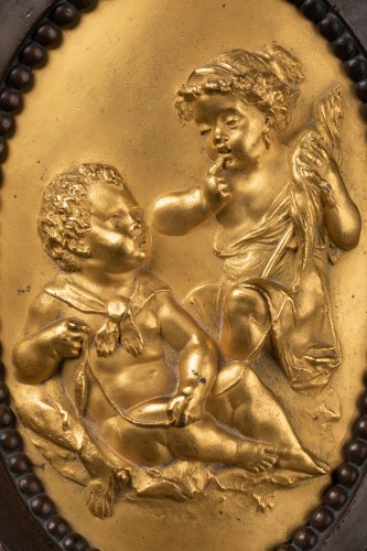 Antiquités - Paire de médaillons en bronze d'époque Louis XVI fin XVIIIe siècle