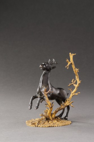 A Small Bronze Group of a Prancing Stag  - 