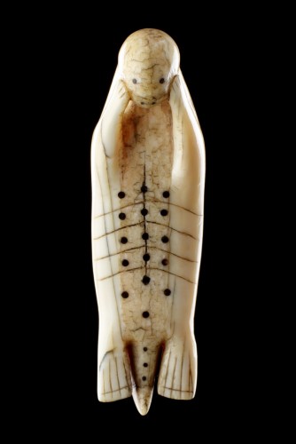 A Fine Large and Rare Inuit Amulet of a Seal Laying on His Back  - 