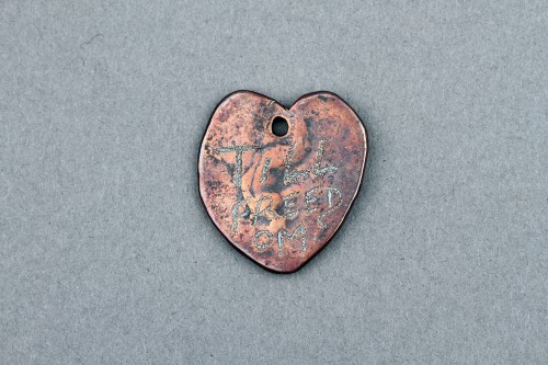 Antiquités - A Rare Collection of Seven Slave ‘Prisoner’ Tokens