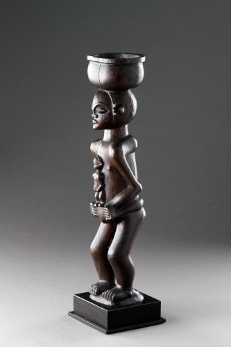 Tribal Art  - A Large Finely Carved ‘Cup Carrier’ of a Women with Child 