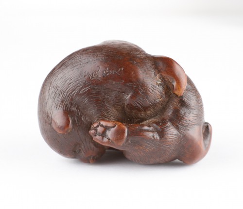 A Finely Carved Wood Netsuke of Two Puppy Dogs Playing  - 