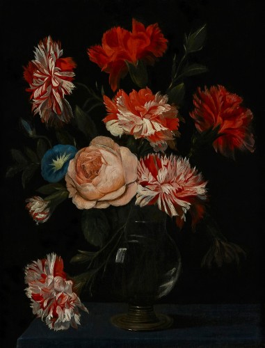 A Flower Still Life with Carnations and other Flowers in a Glass Vase on a 