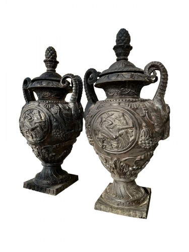 Pair of large covered cast-iron vases