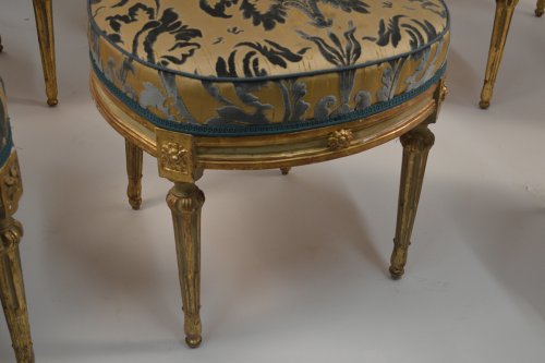 Seating  - Set of eight, Northern Italian, painted and parcel-gilded dining chairs