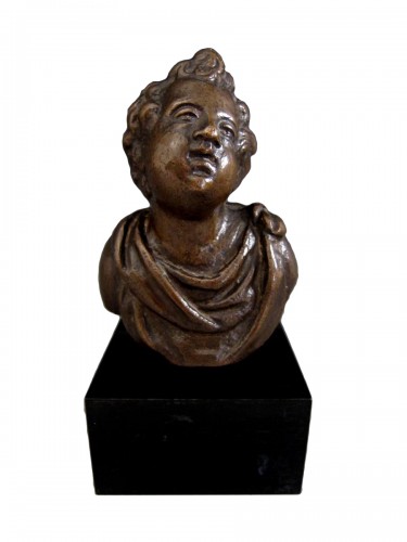 A bronze bust of a cherub, Venice, early XVIIth century