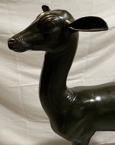  - A young deer in patinated bronze, signed Chiurazzi Napoli.