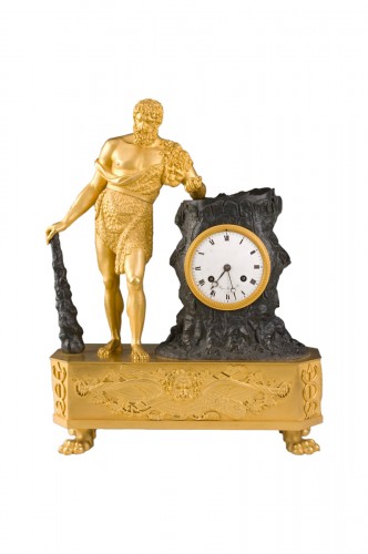 Empire clock in gilded and patinated bronze
