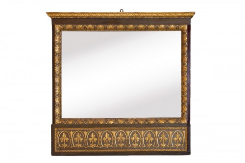 Carved wood mirror painted and gilded in the neoclassical style