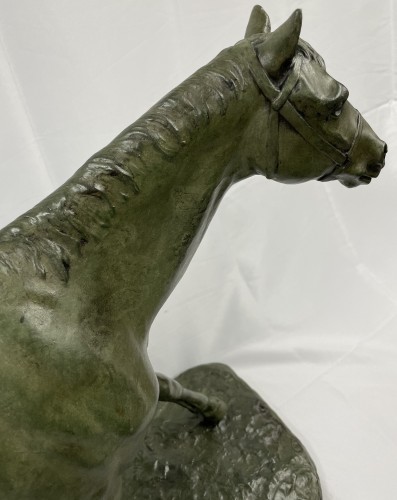 Horse in bronze with green patina signed and dated in the base M. de Mathelin 1900 - 