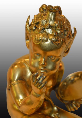 XVIIIe siècle - Feu en bronze doré "aux jeunes Satyres"