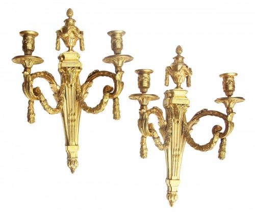 Pair of Louis XVI period wall lights with two very finely chiseled and gild