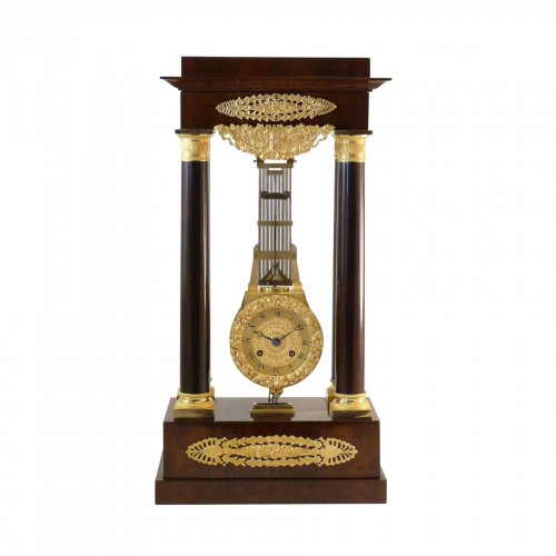 Mahogany swinging clock, Charles X 