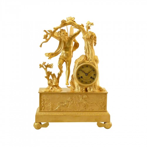 Zéphyr, pendule d'époque Restauration en bronze doré