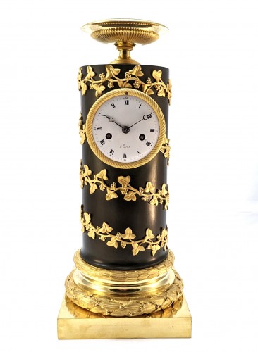 Clock in the shape of a column
