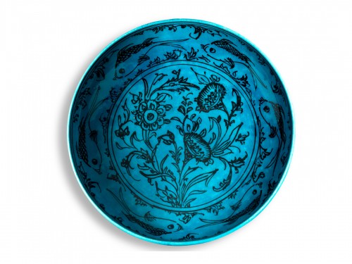 Persian dish with tulip and fish motifs