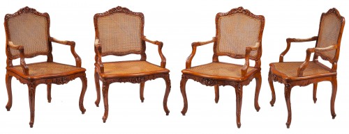Important suite of four large armchairs "à la Reine"