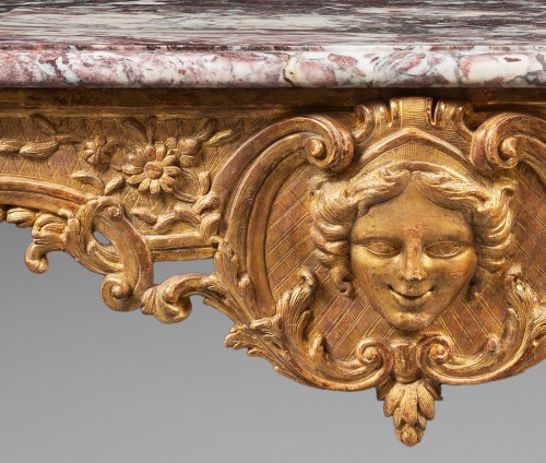 Antiquités - Importante Console d’époque Régence en bois sculpté et doré