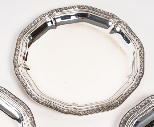 XXe siècle - Puiforcat – Suite de quatre dessous de bouteille en argent début XXe