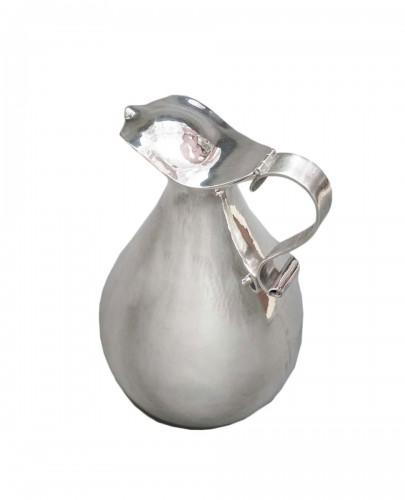 R. Nolle - Covered pitcher in hammered silver 20th century