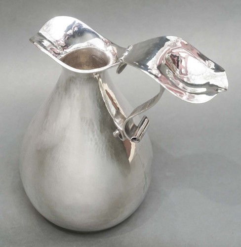 Antique Silver  - R. Nolle - Covered pitcher in hammered silver 20th century
