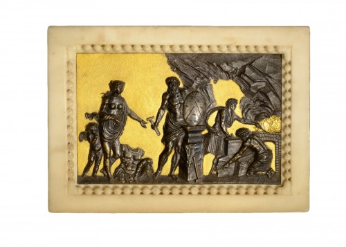 A Gilded and Patinated Bronze Relief within a Carved Marble Frame 