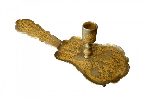 A rare Louis XV gilt iron Chamberstick