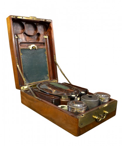  A mahogany officer`s travelling dressing and breakfast set