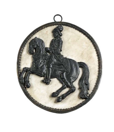 17th century sign, Cast iron horseman in a marble medallion